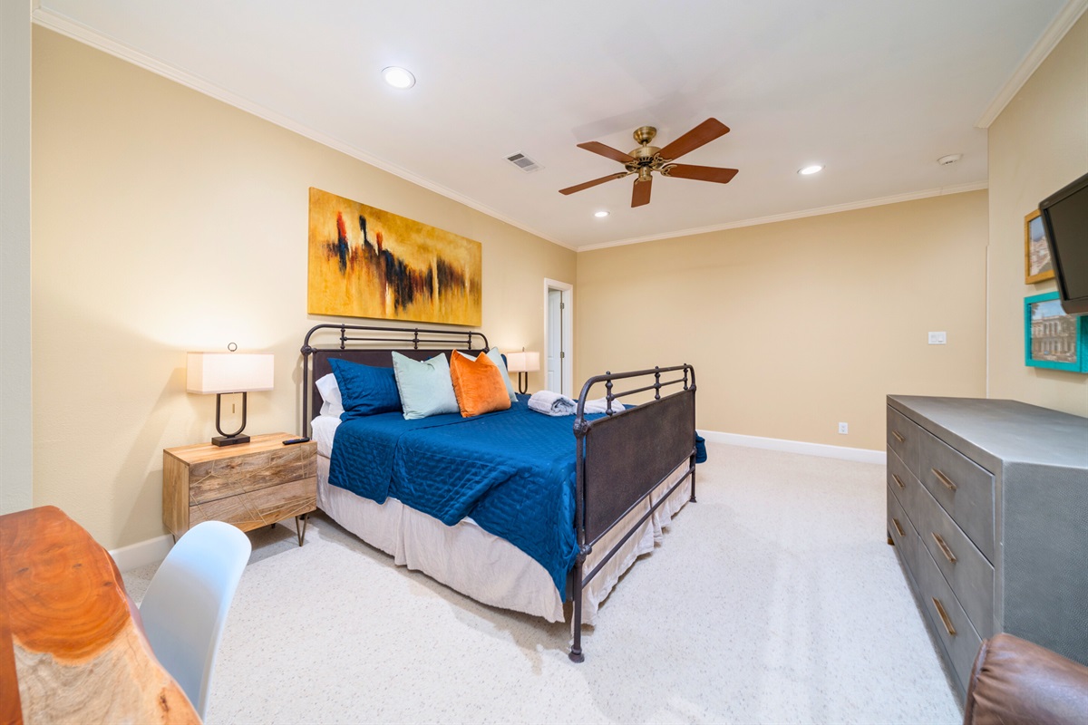 [Bedroom 2] The Second Bedroom Features a King Bed and an En-Suite Bathroom.
