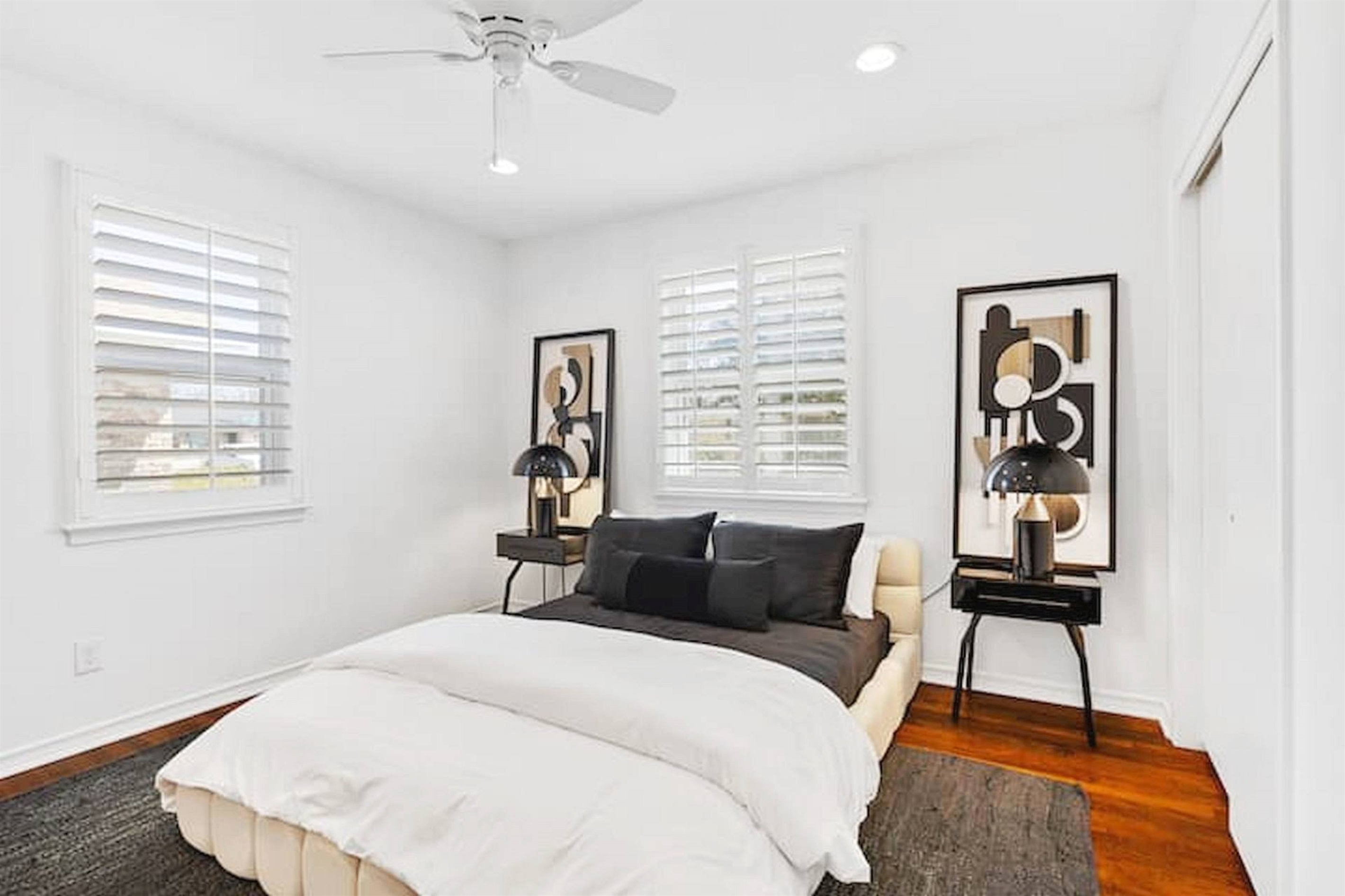 Comfortable and thoughtfully styled bedroom with warm wood floors, natural light, and a calming atmosphere designed for restful stays. ✨🛏️