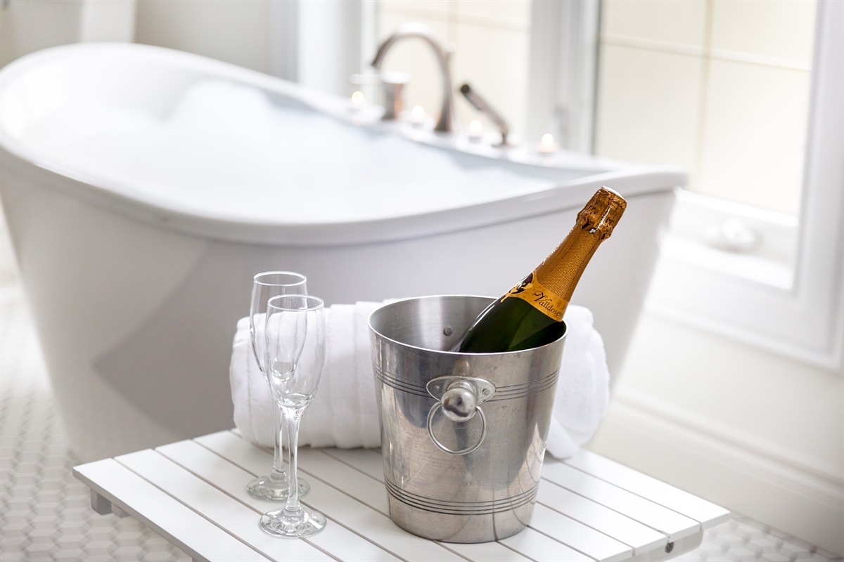 Ensuite bathroom with luxurious soaker tub.