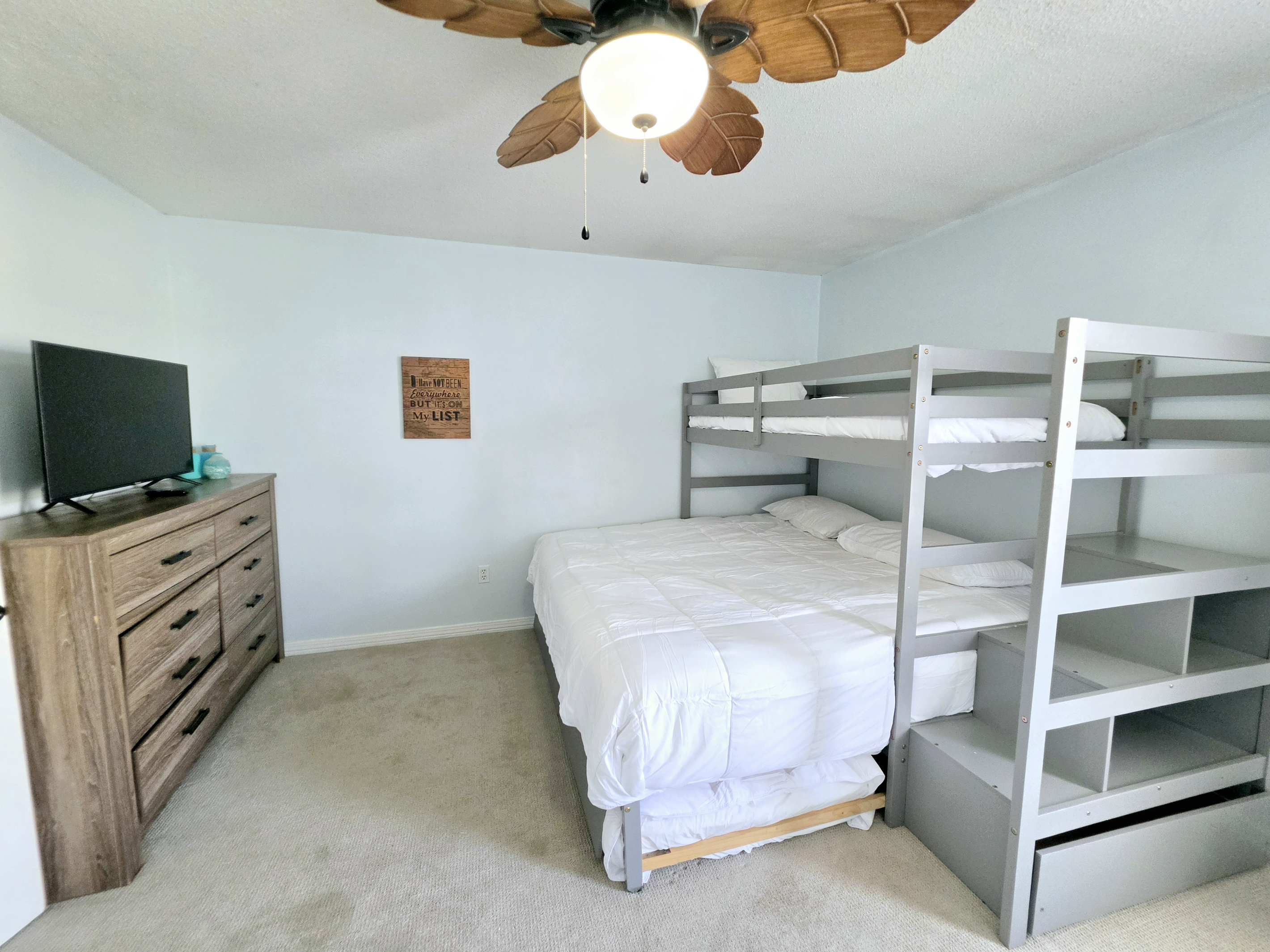 Nest side – Bunk room: king bed below, twin above, twin trundle
