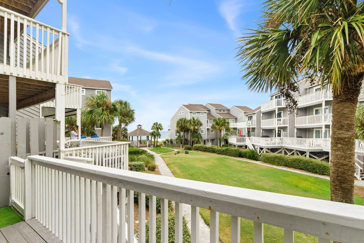 Step out onto the main deck and spot where the boardwalk leads &mdash; the beach is right there.