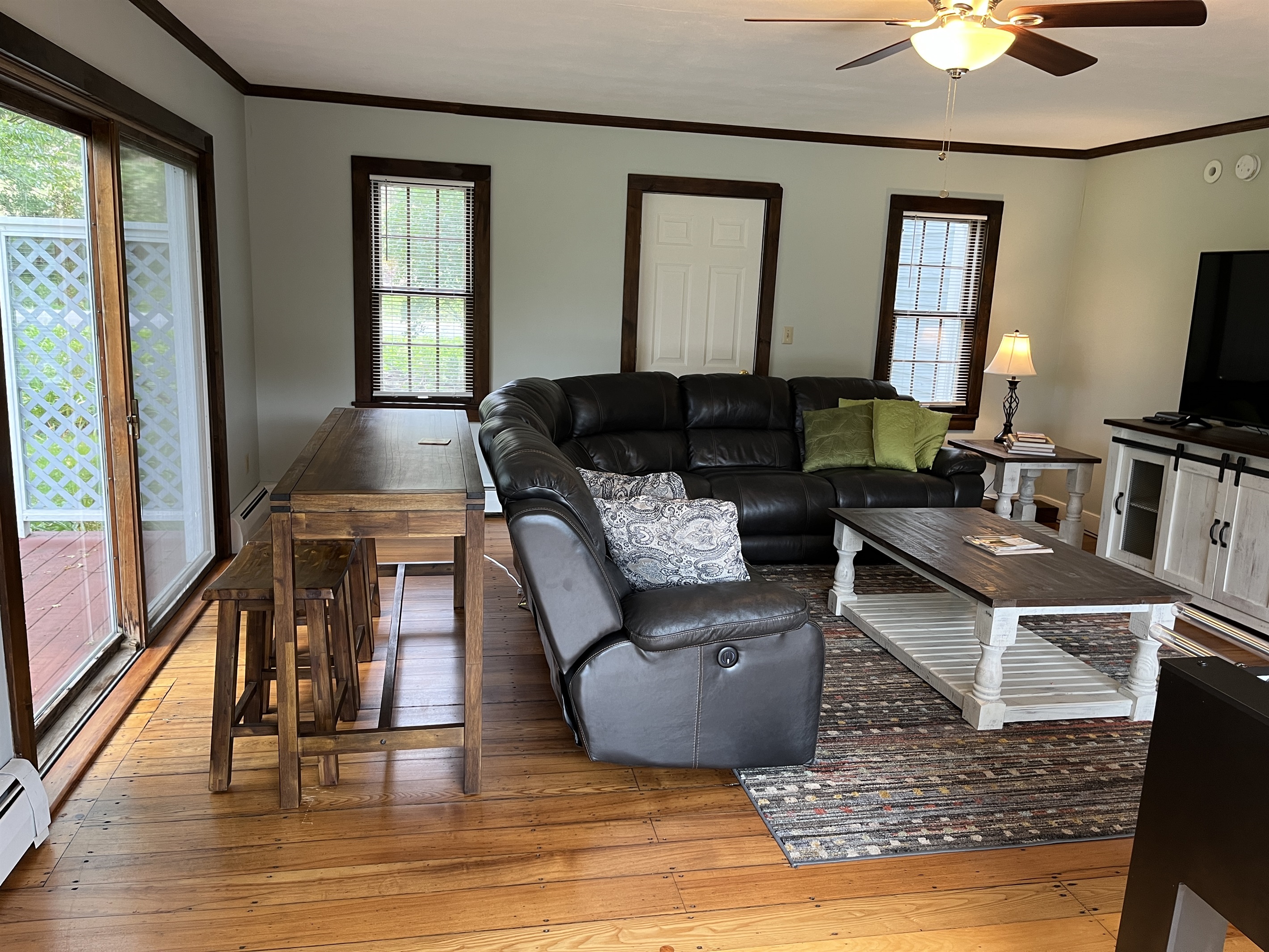 Cloverleaf Farm main living room with  large sliding glass doors to the side deck.