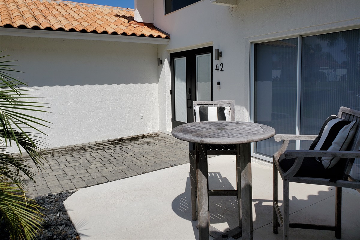 Front entrance and patio/chairs