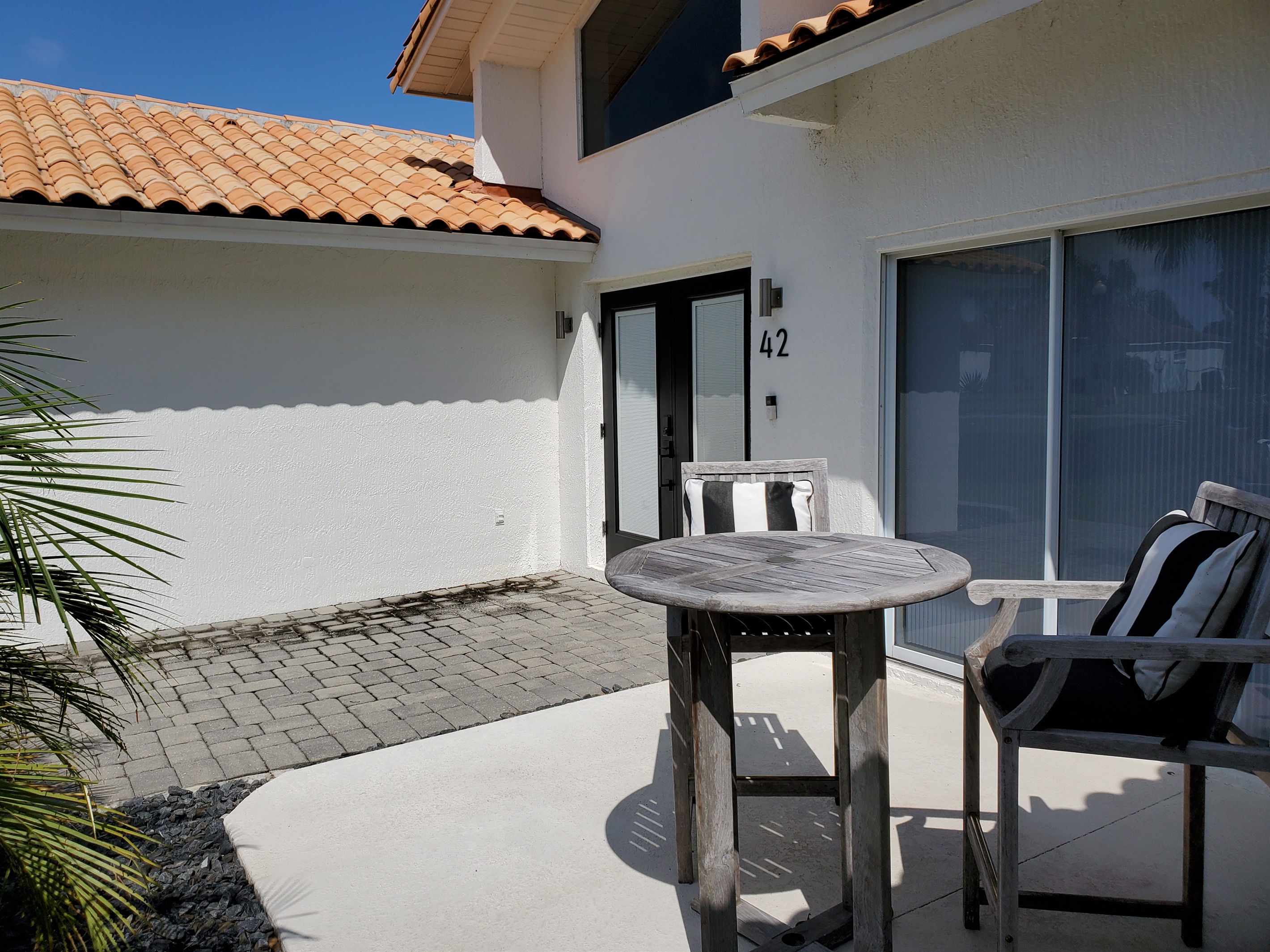 Front entrance and patio/chairs