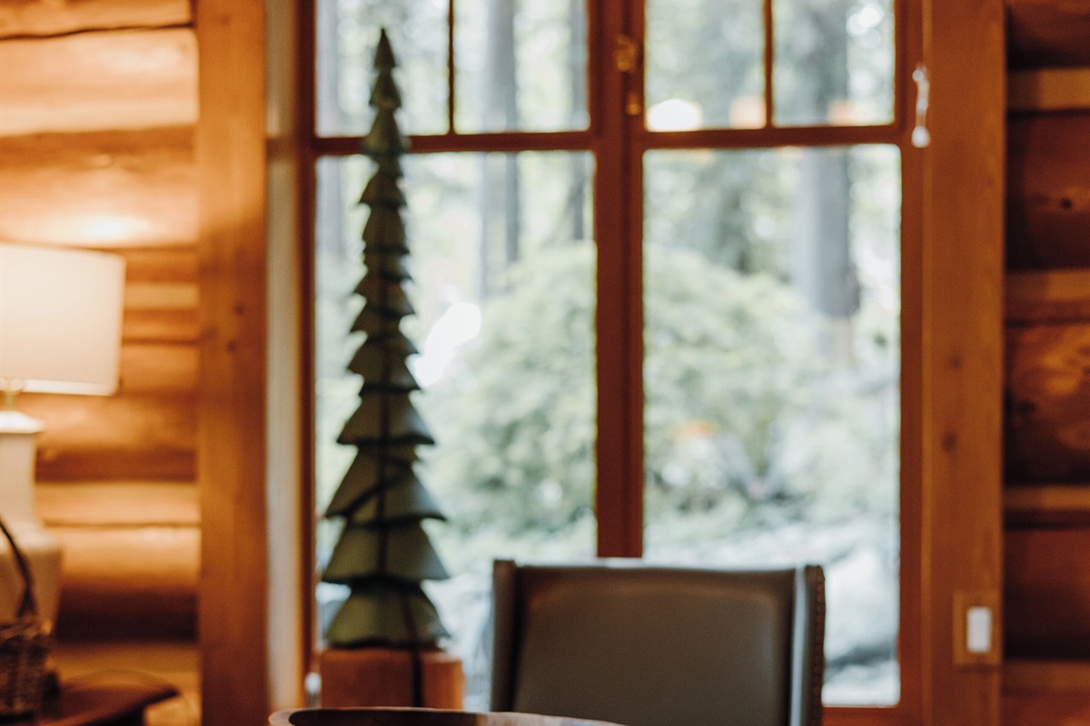 A dining table designed to comfortably seat 8 people.