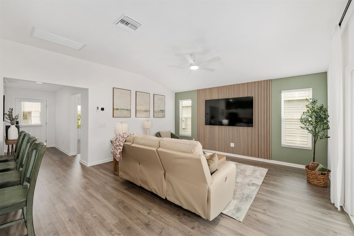 A large 75 inch TV is available for viewing enjoyment from the comfortable reclining sofa.  The acoustic wall feature provides a nice sound enhancement.  *Please Note:  You will need to log into your streaming apps as TV service is not provided.