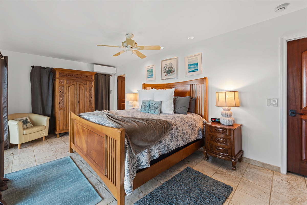 This second primary suite is located downstairs, has balcony access and an ensuite bathroom.