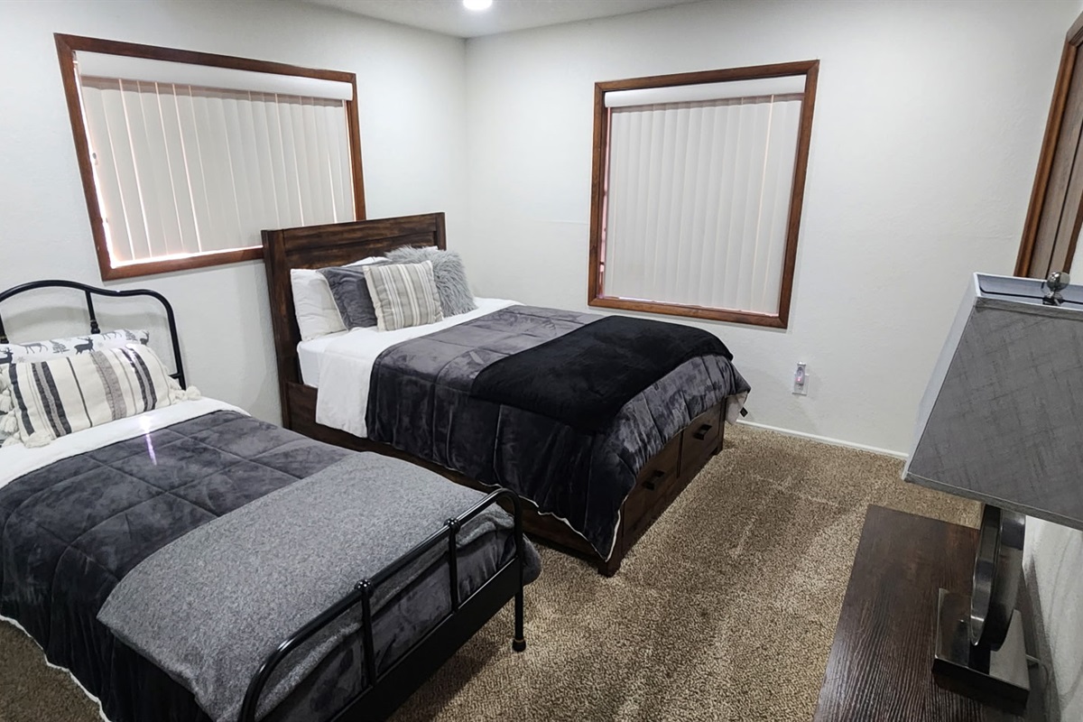 Bedroom 2 has one double bed and one twin bed.