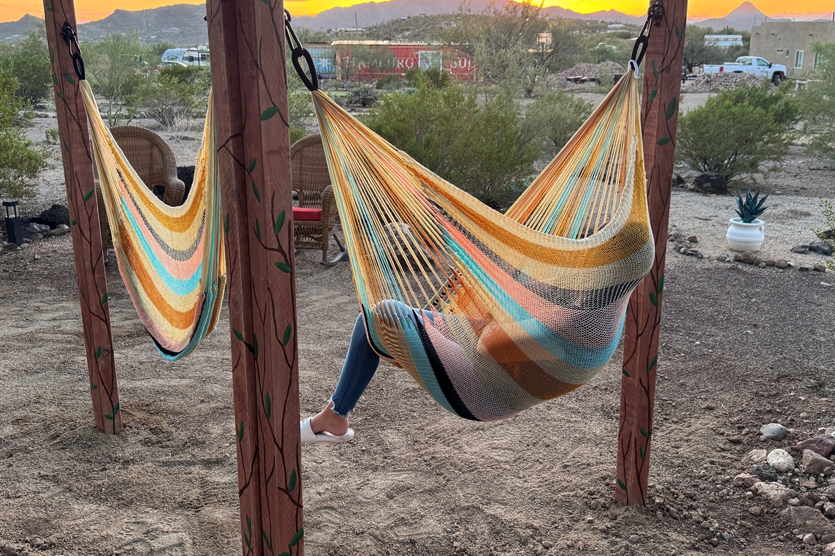 Yellow leaf hammock chairs offer a cozy, relaxing place to read a book or cuddle with a little one.