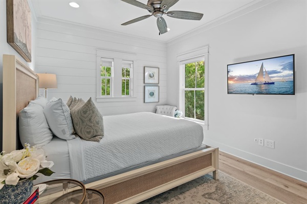 Spacious 2nd level queen bedroom suite with full ensuite bathroom, tiled shower, and a large vanity.