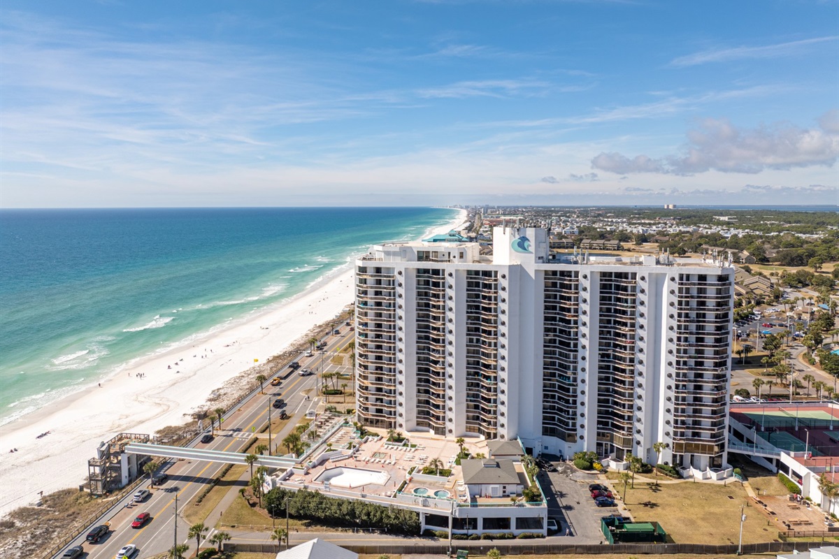 This is what Gulf-front actually means. One of Destin's most iconic towers, positioned right on the Gulf with sugar-white sand, a private beach walkover, and the emerald water just steps from the lobby.