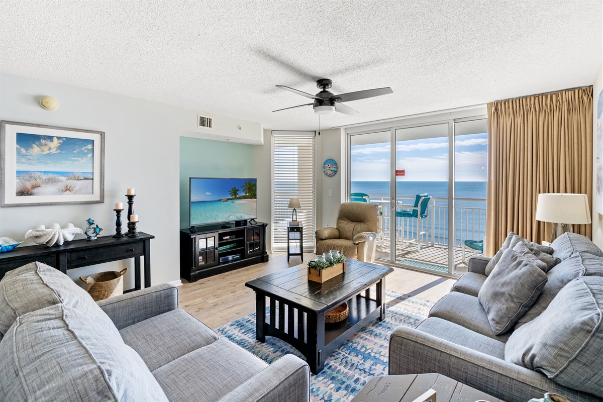 Beautiful Oceanfront Living Room with balcony access