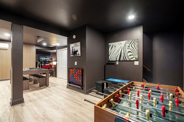 Game room with pool, foosball, video games, and more