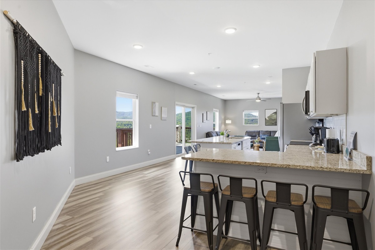 Don’t miss the second setup—another four seats means more room to gather, spread out, and stay connected. No one’s stuck on the sidelines in this kitchen.