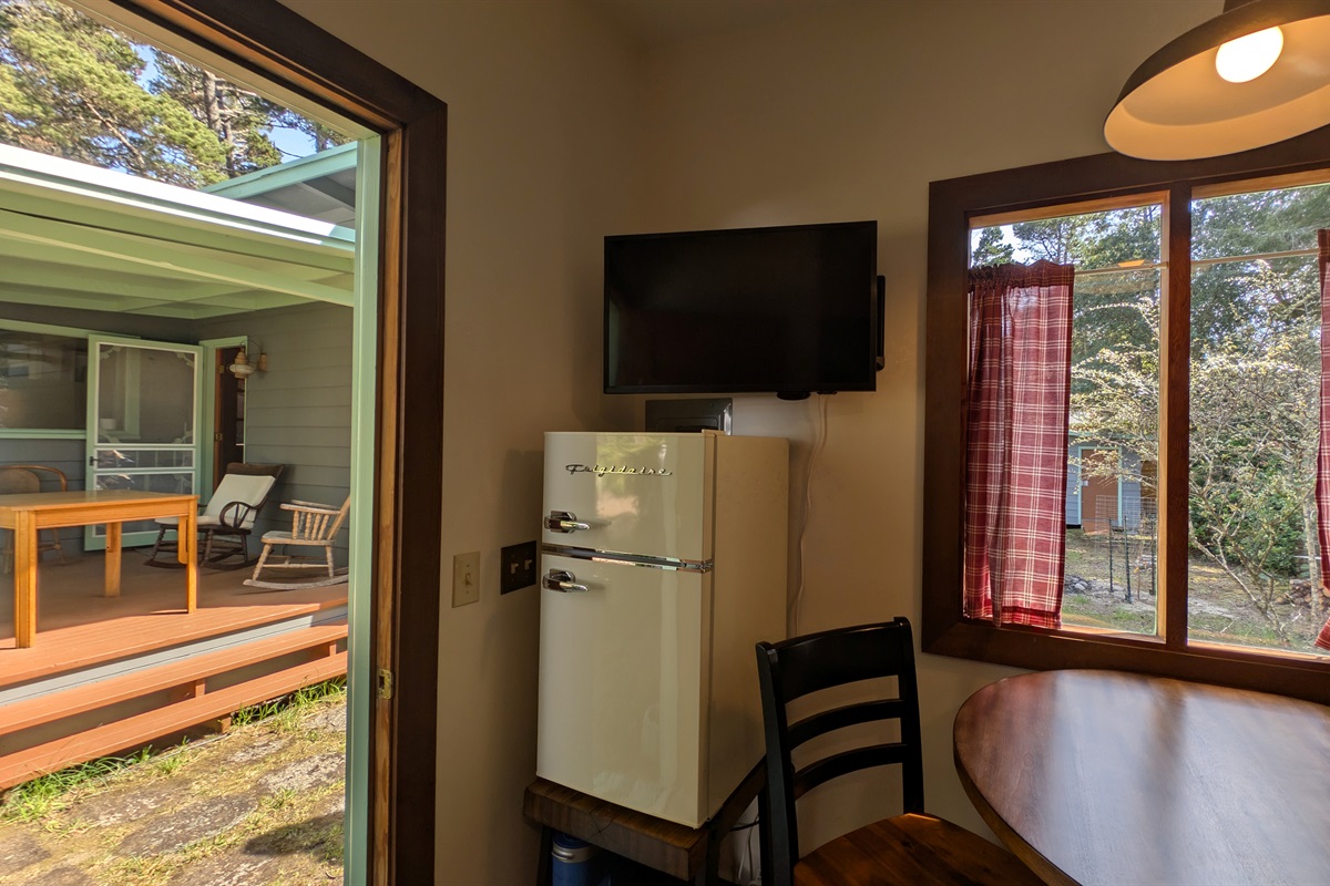 television, microwave, refrigerator/freezer in bunk house with table for 2