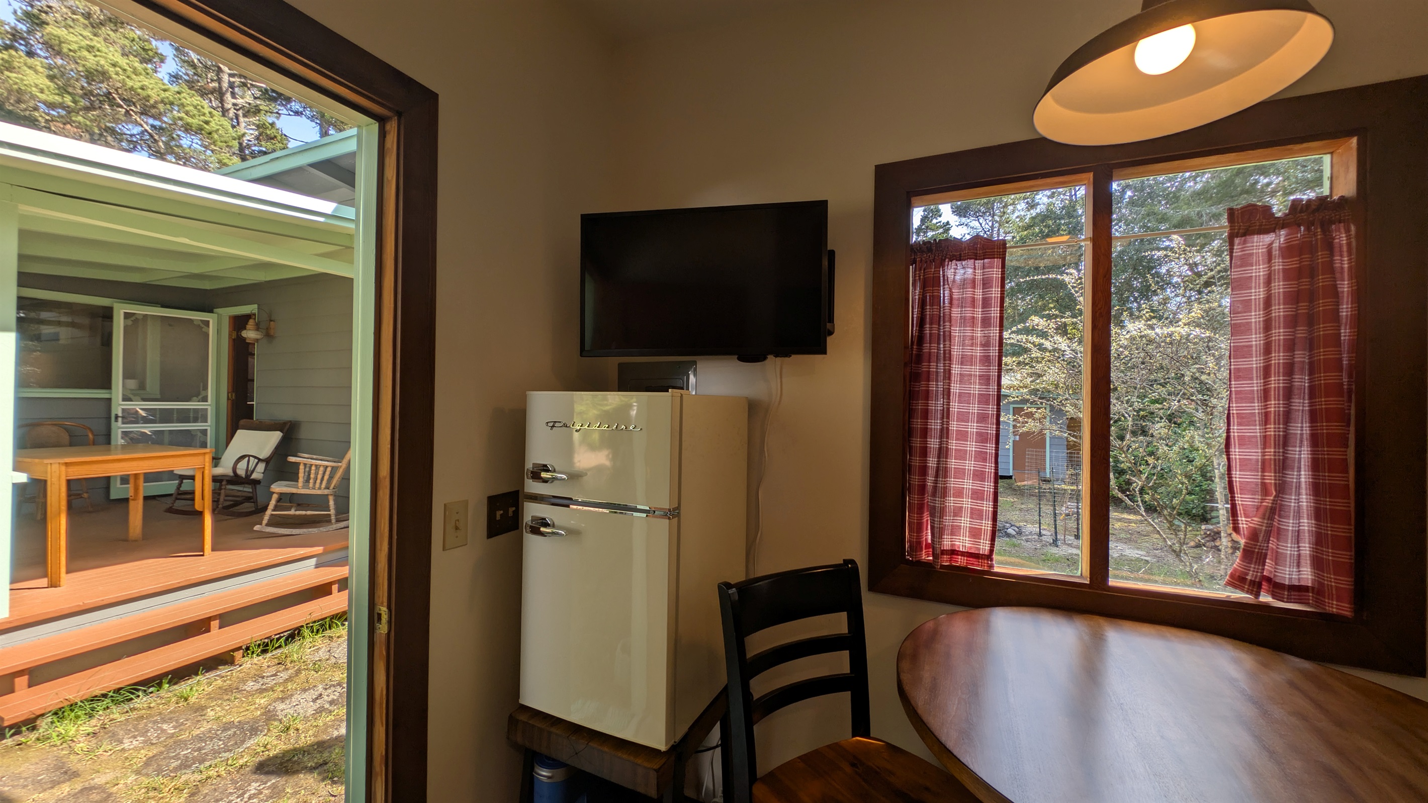 television, microwave, refrigerator/freezer in bunk house with table for 2