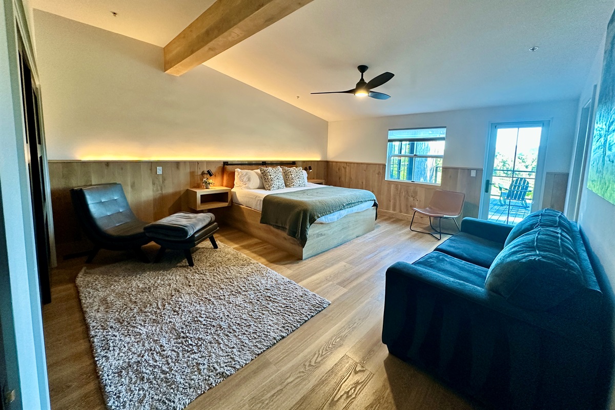 Enjoy the space and comfort of this expansive suite with a California King bed and a premium queen pull-out sofa for additional sleeping space.