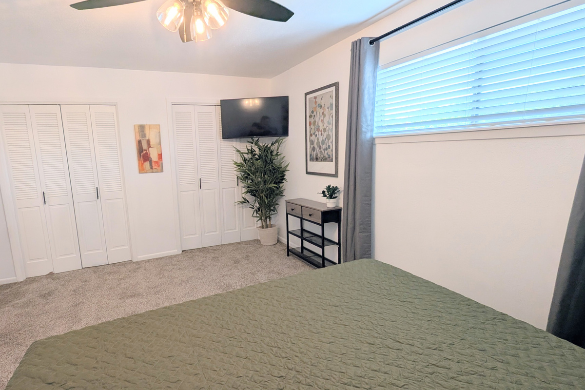 Unwind while watching the Roku TV in the king bedroom. 