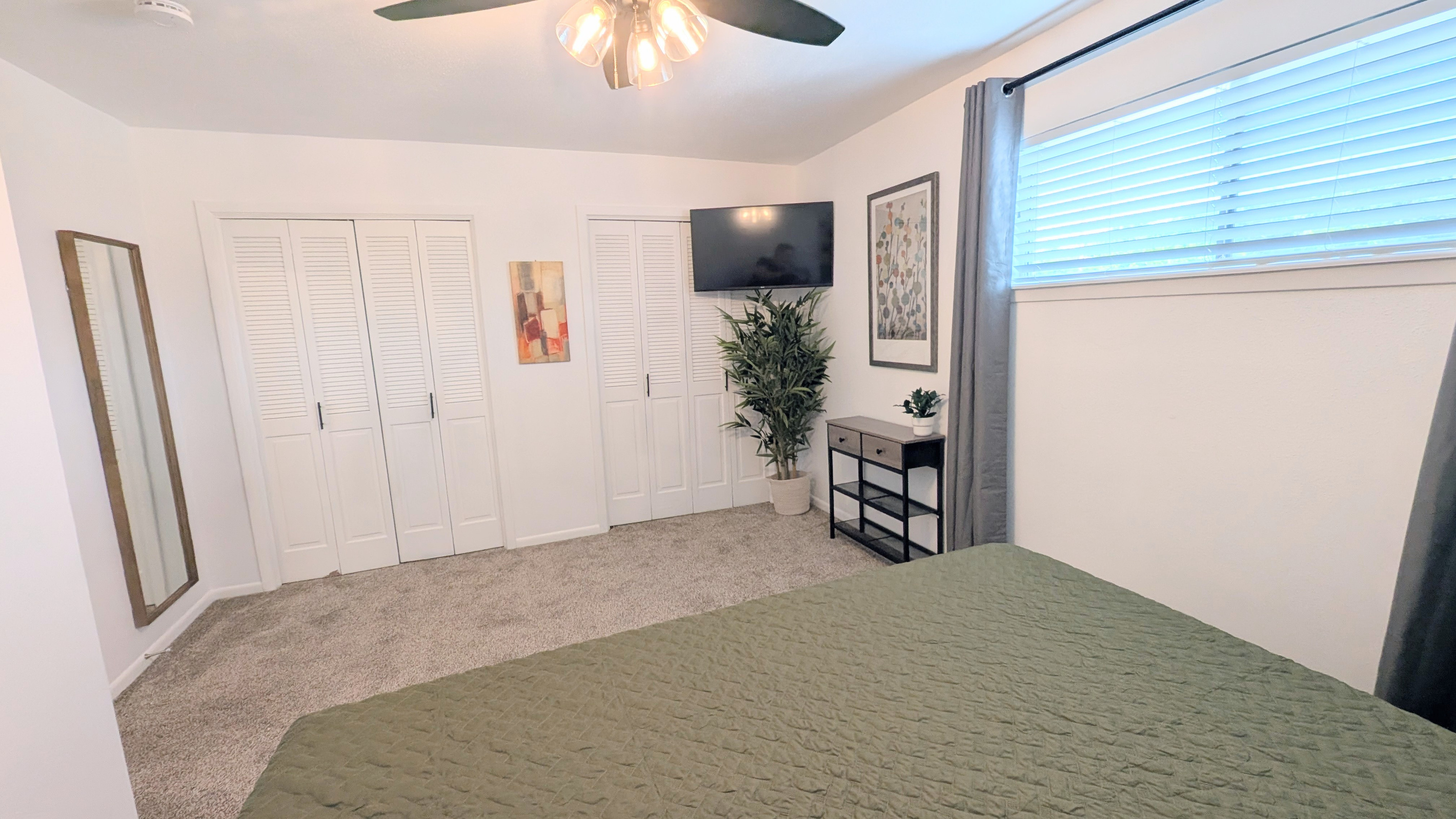 Unwind while watching the Roku TV in the king bedroom. 