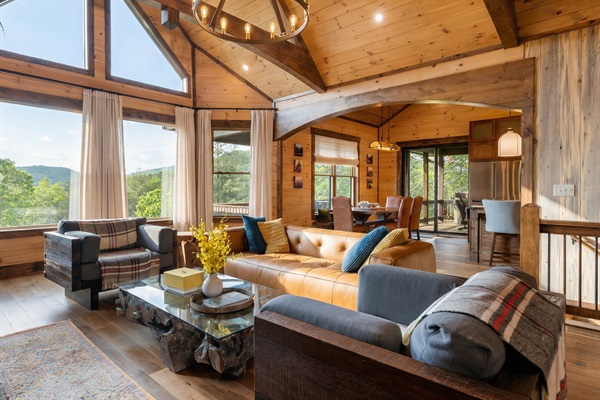 Kick back in this inviting living space, filled with natural light and scenic views from every angle.