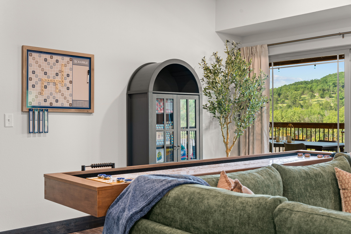 Even the wall Scrabble board spells out LONE STAR LODGE, a playful nod to your Branson-area home base.