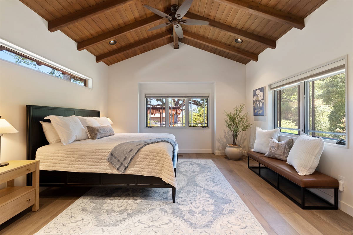 Primary suite featuring a king bed, dedicated office, and spa-like ensuite