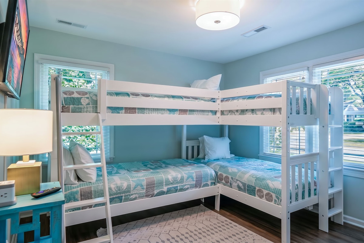 Bunk Bedroom 4 has a set of two bunk beds for a fun kid's bedroom!  Updated beach bedding for a fun retreat! | IOP Escapes Beach Blessing | 3705 Hartnett Blvd, Isle of Palms, SC