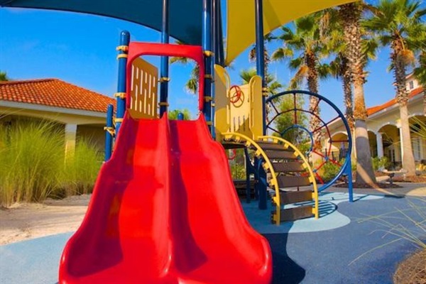 Slide down the slide with your buddy!
