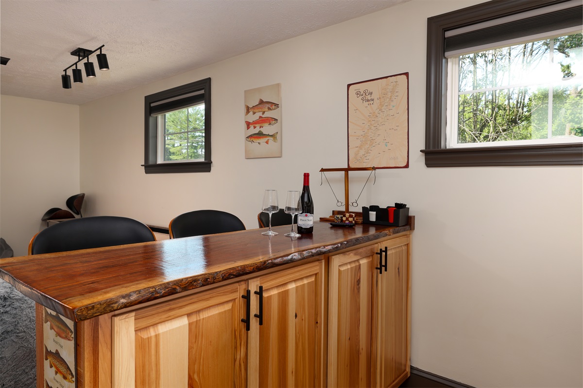 Full bar with custom black walnut bar top