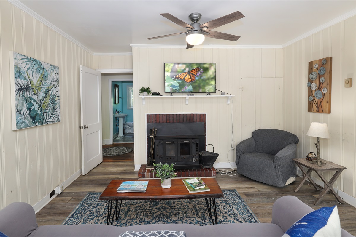 Living Room- Roku TV, fireplace, Open to dining area and kitchen