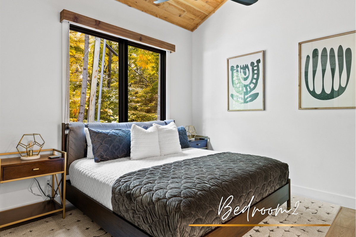 The second bedroom features a king bed and double bed, offering a versatile and welcoming space for guests.