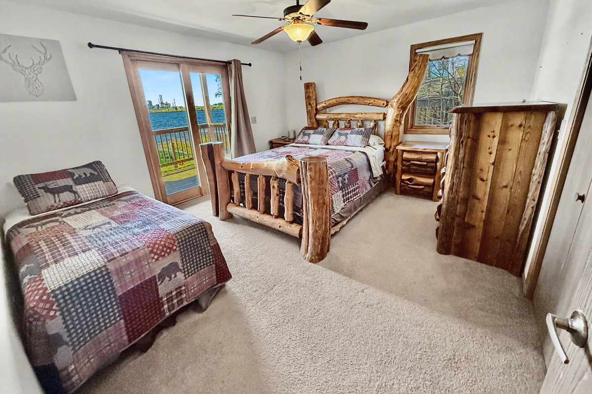 Bedroom - Queen and Twin Beds with Private Deck Access