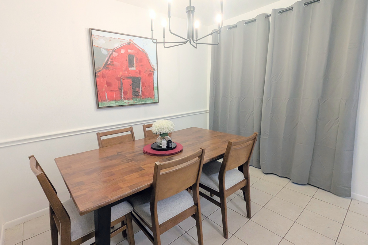 Dining room with room to play games or eat a meal together. 