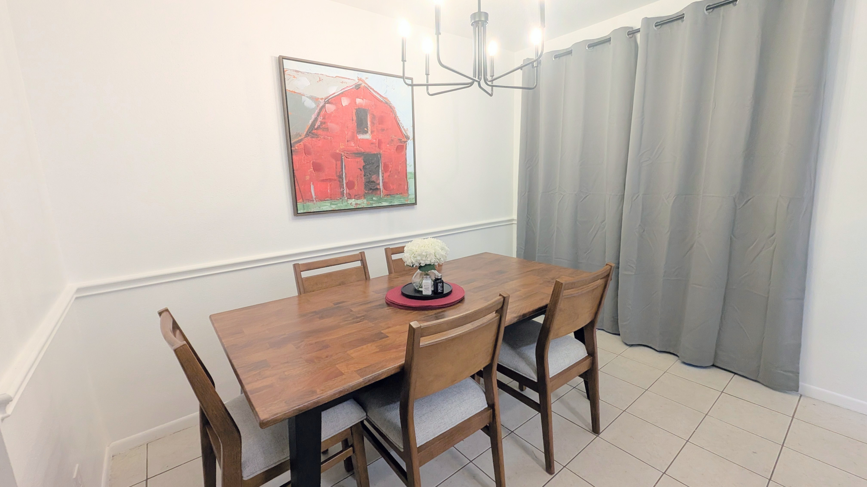 Dining room with room to play games or eat a meal together. 