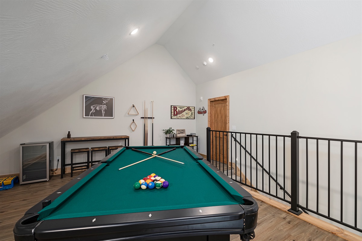 Pool table and mini fridge upstairs!