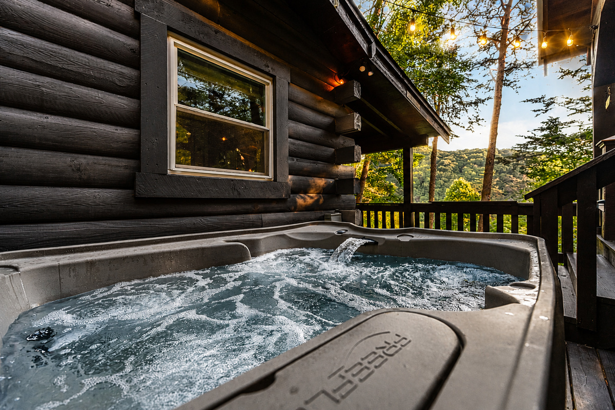 Soak away your cares in the steaming hot tub, just steps from the covered porch.