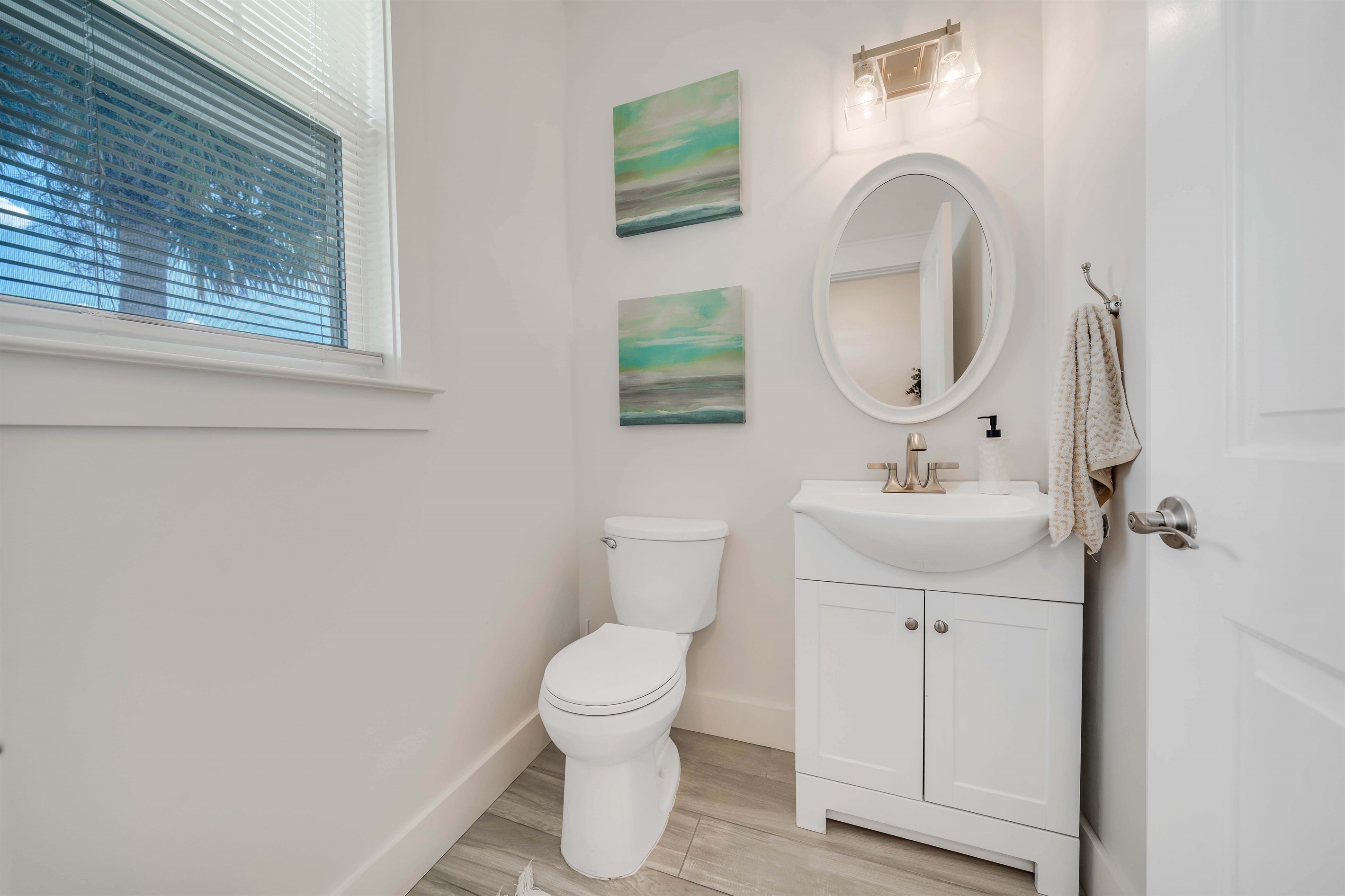 Half Bath right upon entry where you will find complimentary hand soap and basic toiletries waiting for you on the counter.
