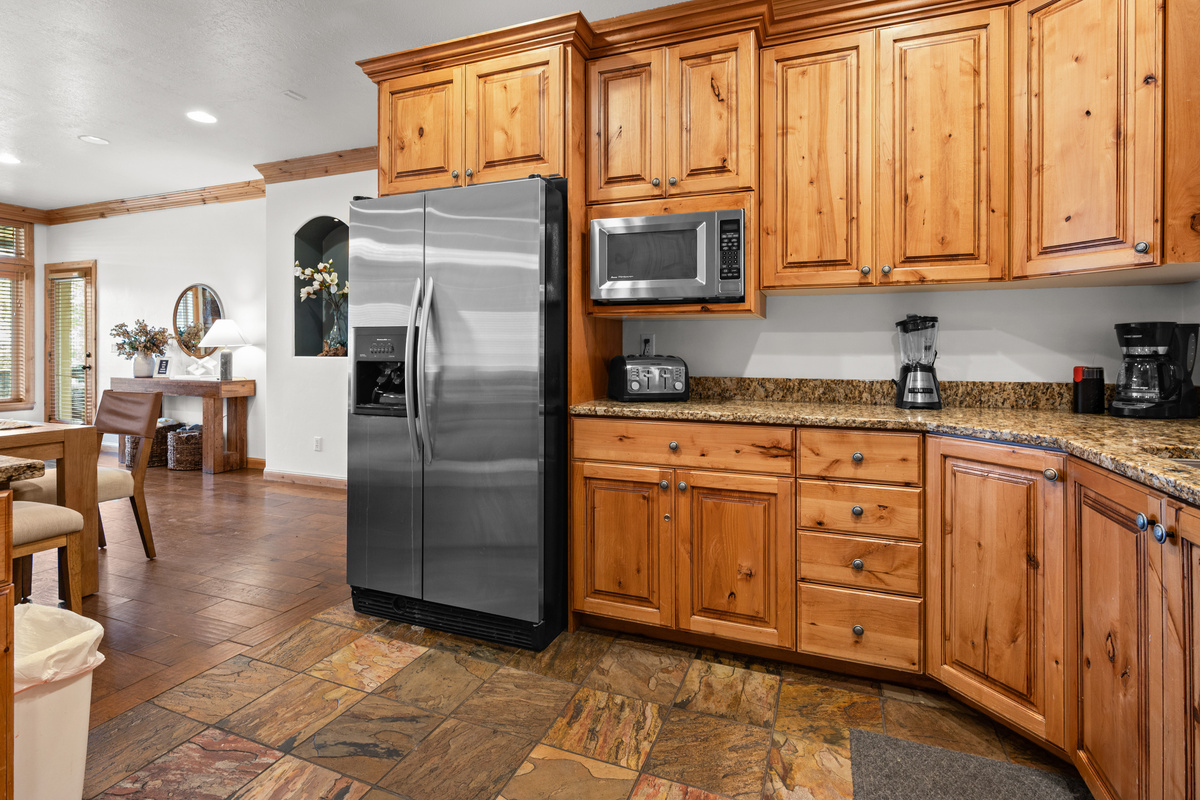 Full-size refrigerator, microwave, coffee maker, and plenty of kitchen storage for longer stays.