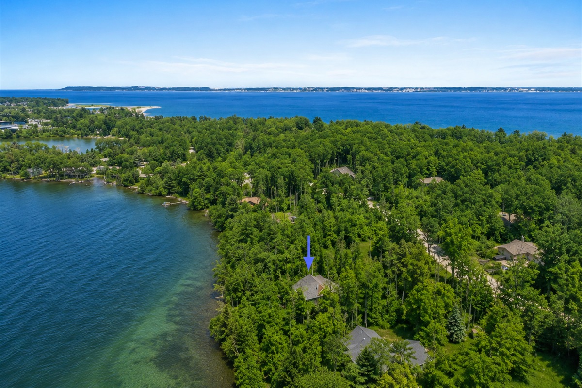 The home is located on Bass Lake in Elk Rapids but is also close to Lake Michigan, Elk Lake and Torch Lake.  