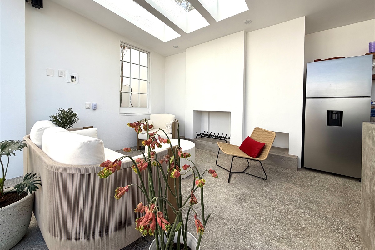 Outdoor Living Room w Fireplace Pool Level