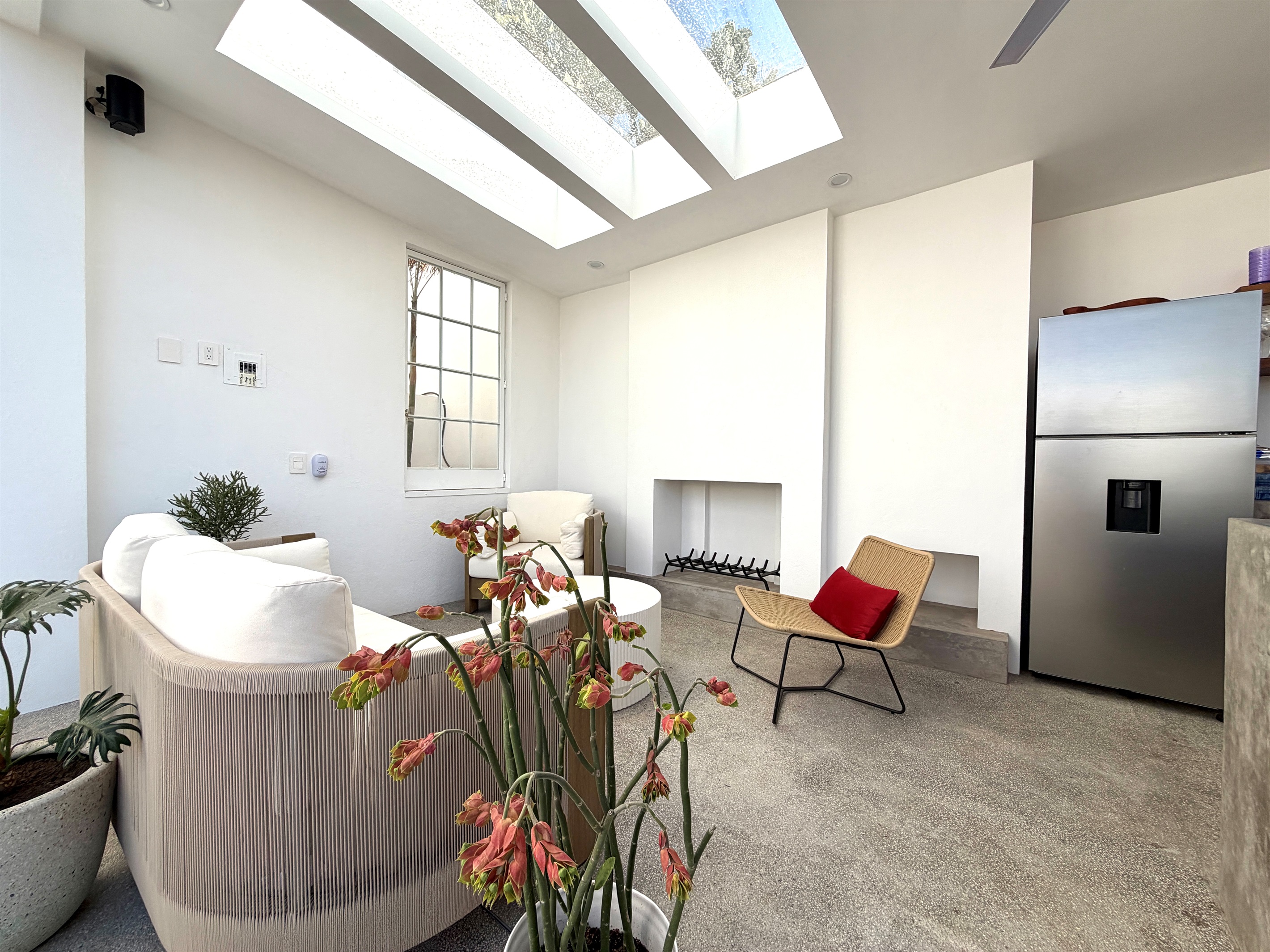 Outdoor Living Room w Fireplace Pool Level