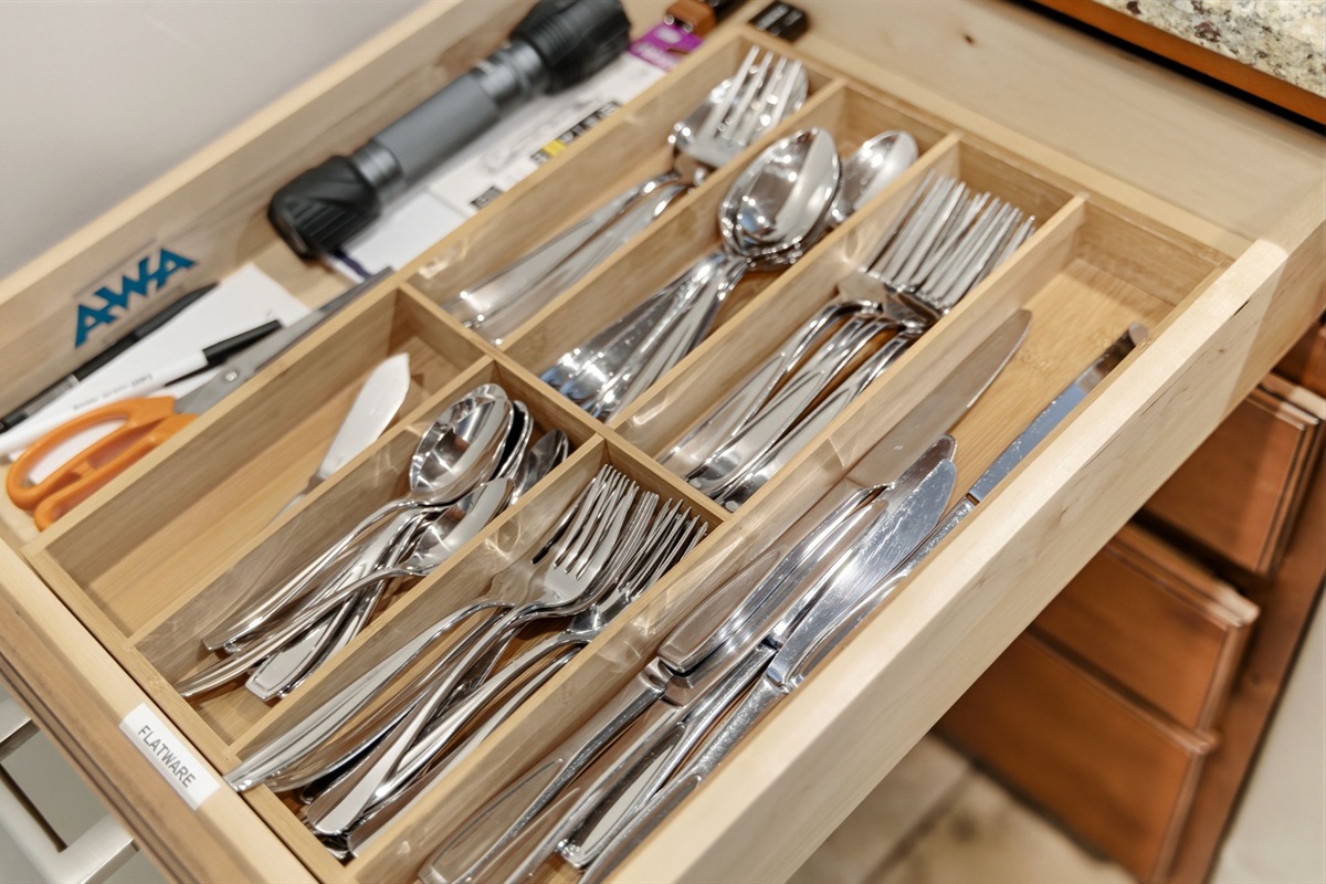 Silverware fully stocked.