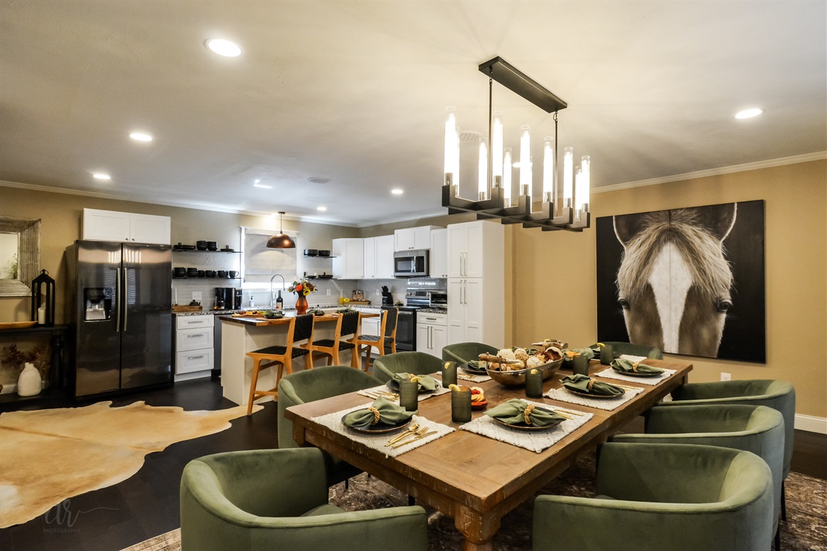 Gather & Dine Together → Fully equipped kitchen with modern appliances, coffee bar & dining space designed for laughter and connection.