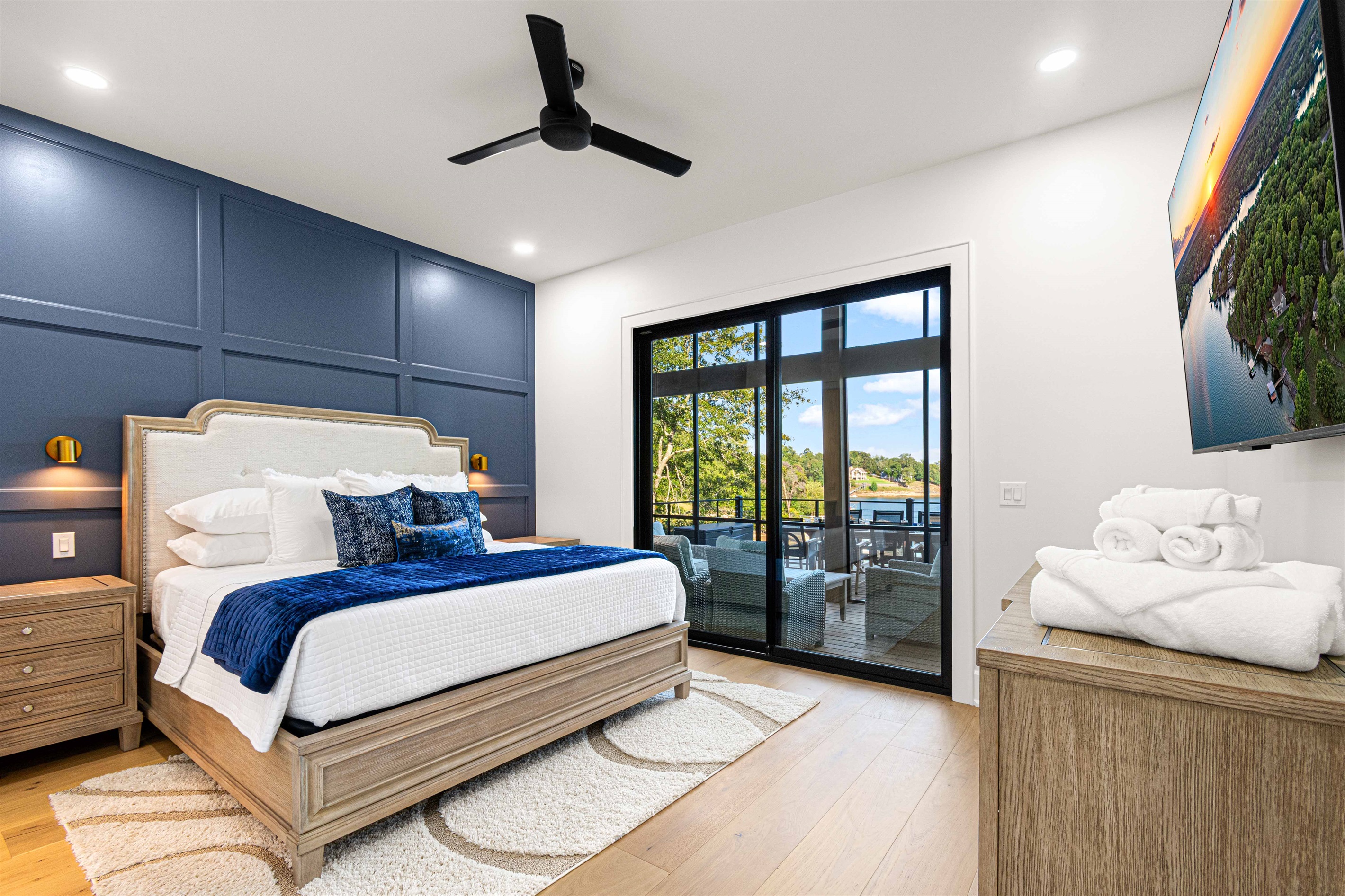 Master bedroom on the main level with access to the patio.