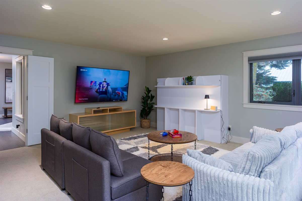 Game night or movie night?  You can enjoy both in this media room that features a big screen tv, built-in Xbox games and plenty of seating.