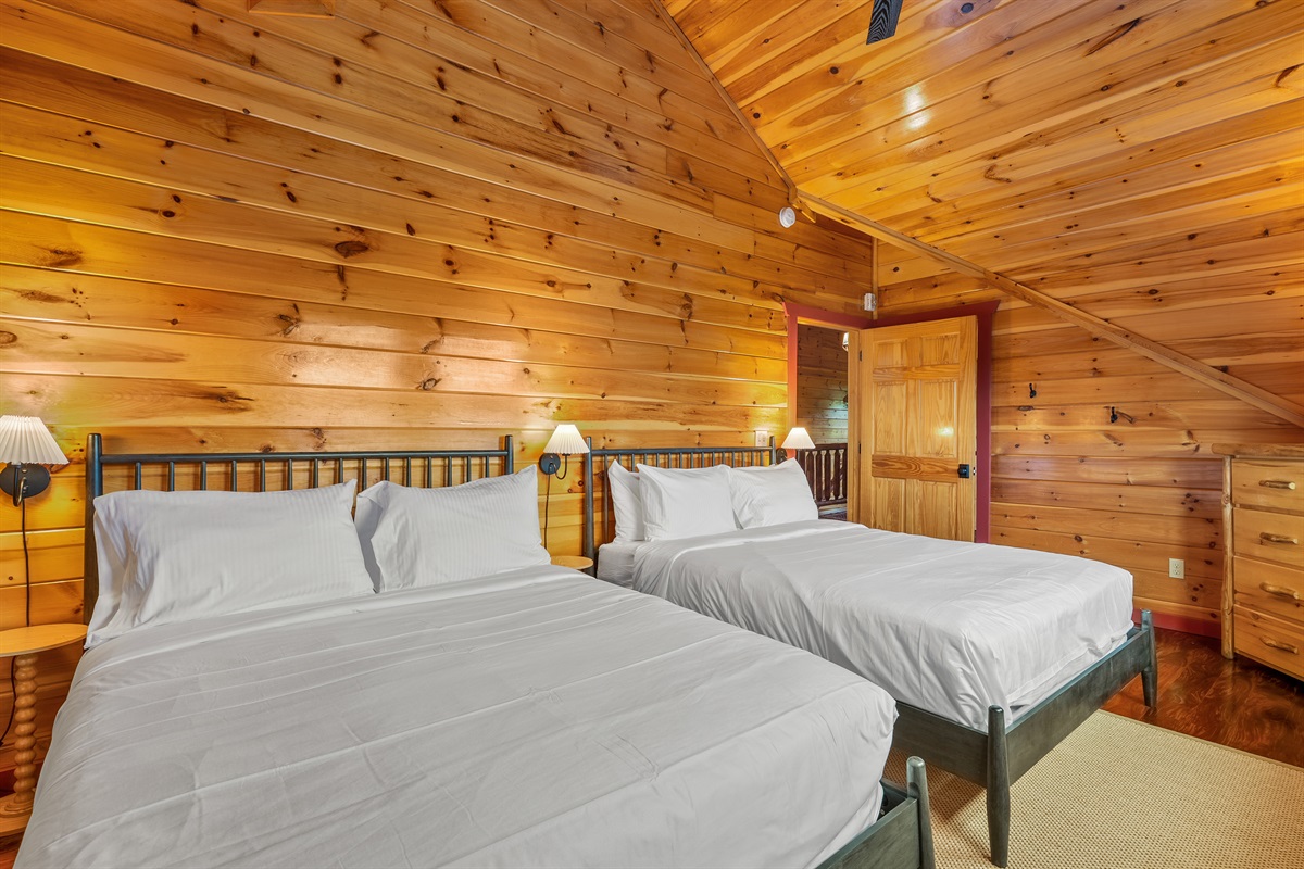 Swap bedtime stories in our upstairs double queen bedroom! (Bedroom 4)