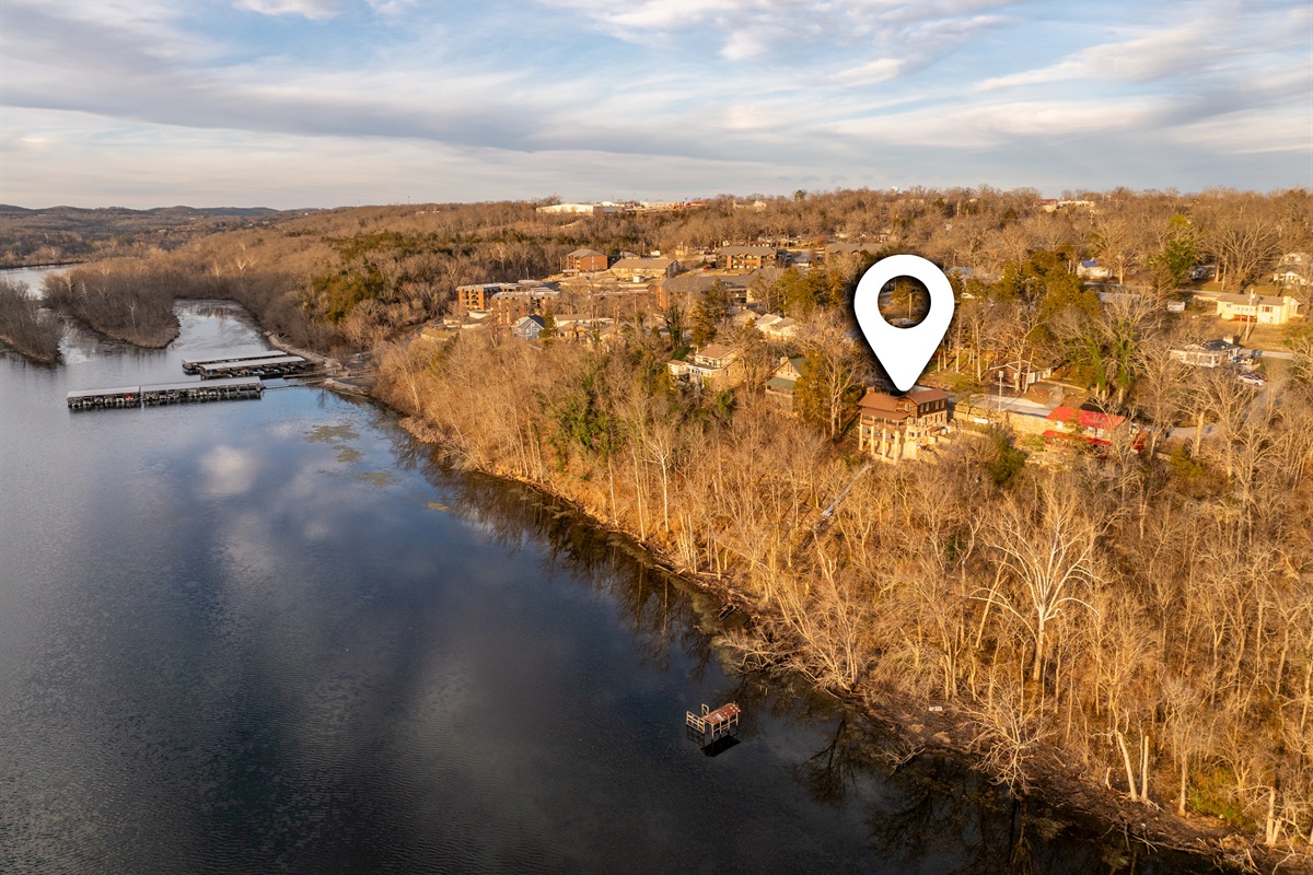 A cliffside retreat, perfectly framed by the lake