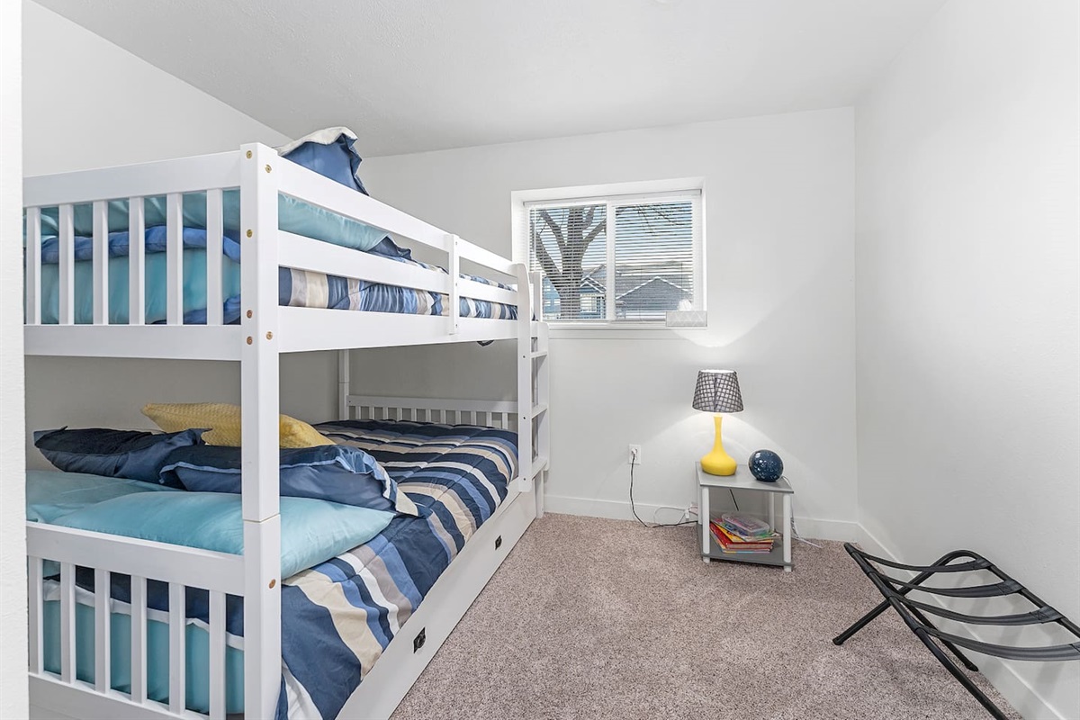 Lower level Bedroom 3. Full size bunk beds w/ trundle! 