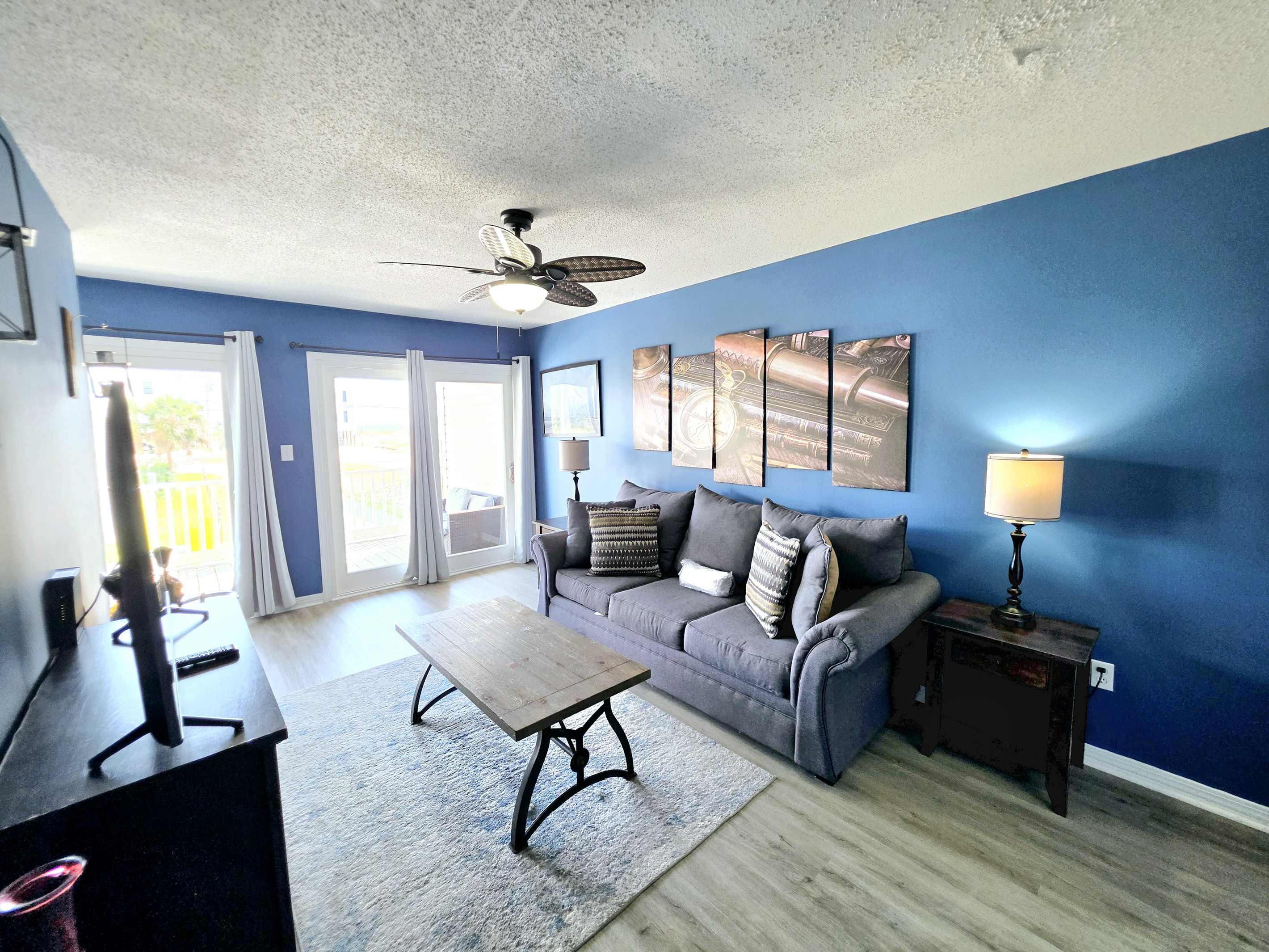 Living room with sofa and ceiling fan