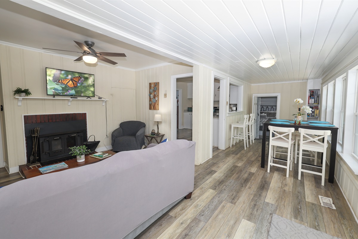 Living Room- Roku TV, fireplace, Open to dining area and kitchen